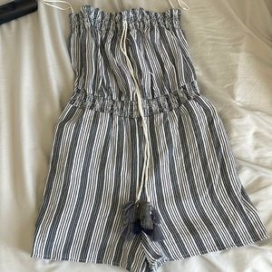 Blue and white striped romper with tassels